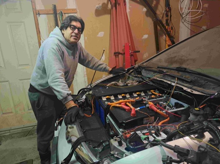 Mohamed Samy Hosny working on the electric conversion of his car